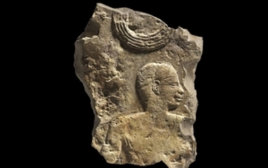 AN EGYPTIAN LIMESTONE RELIEF OF A MAN Old...
