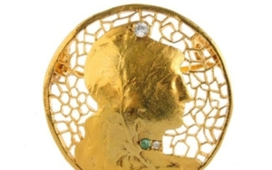 A gem-set brooch. The slightly domed disc, depicting a