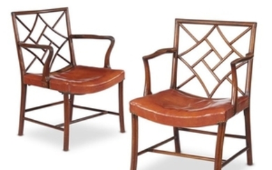 A pair of George III mahogany 'cockpen' armchairs last...