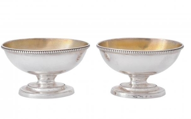 A pair of George III silver pedestal oval salt cellars by William Abdy I