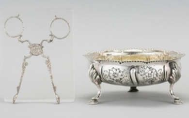GEORGE III STERLING SILVER BONBON DISH AND TEA TONGS Bonbon dish: Lacking maker's mark. Shallow bowl with scalloped rim and repoussé..
