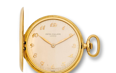 Patek Philippe. A fine 18K gold hunter cased slim dress watch