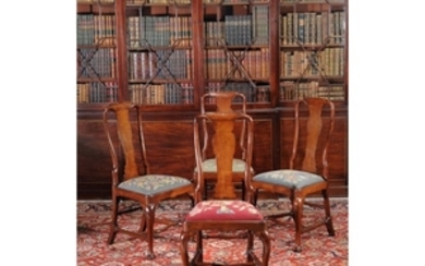 A set of four George I walnut chairs