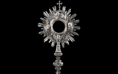A silver monstrance. Papal State, Rome, 1750. Silversmith Giuseppe Bartolotti (h. cm 62) (g loss 1265 ca.) (defects and restorations)