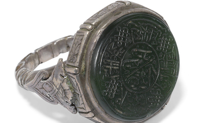 A SILVER AND NEPHRITE JADE SEAL RING, TIMURID IRAN, SECOND HALF 15TH CENTURY