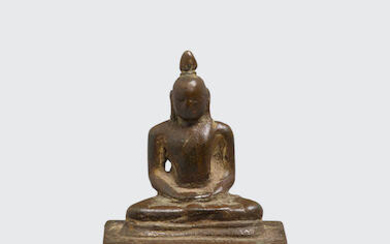 A copper alloy figure of Buddha