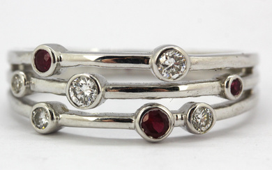 9CT RUBY AND DIAMOND RING.