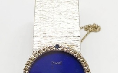 Womans Piaget 18k gold diamond and sapphire bezel watch- Circa 1980