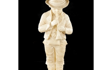 A 19TH CENTURY CARVED ALABASTER FIGURE OF A BOY PLAYING AN I...