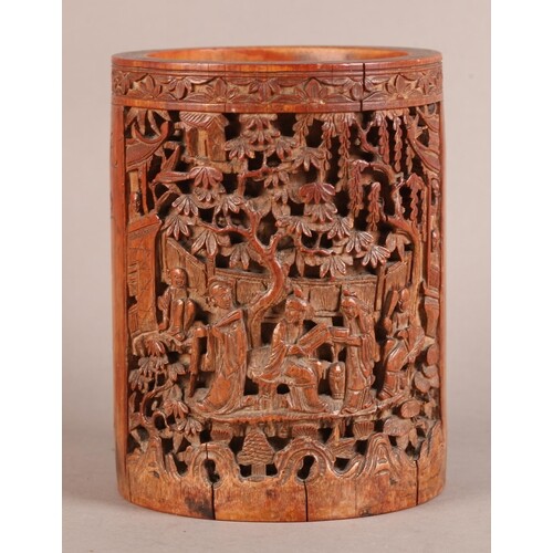 A 19TH CENTURY CHINESE BAMBOO BRUSH POT, carved in relief wi...