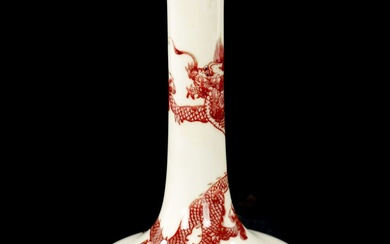 A 19TH CENTURY CHINESE IRON RED BOTTLE VASE decorated...
