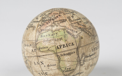A 19th century pocket globe, formed from twelve printed gores, diameter 4cm, together with an origin