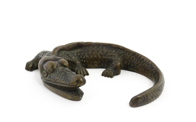 A 20thC cast bronze model of a crocodile / alligator. Approx...