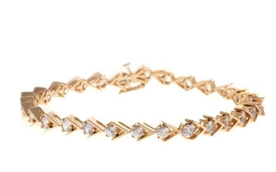 A 5.90 ct Diamond Line Bracelet in 14K Yellow Gold