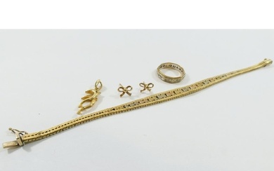 A 9 carat gold tri-colour bracelet, a 9 carat gold ring, a p...