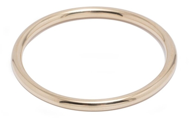 A 9CT GOLD HOLLOW BANGLE; 4.85mm round bangle with internal dia. 60mm, wt. 9.19g.