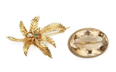A 9ct gold and gem set brooch, in the form...