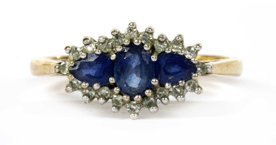 A 9ct gold sapphire and diamond three stone cluster ring