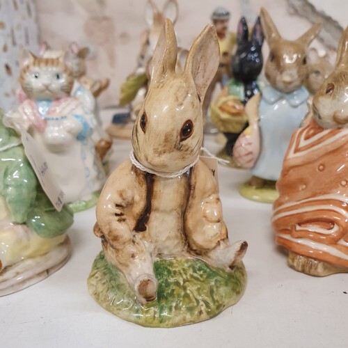 A Beswick Beatrix Potter figure, Benjamin Bunny, and ninetee...