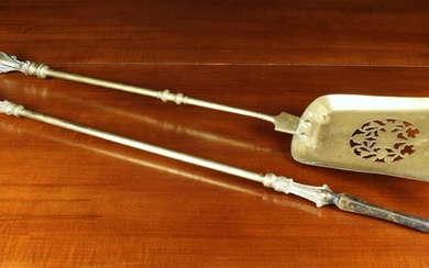 A Brass Fire Shovel & Poker with elaborately cast handles. The shovel having a pierced bell shaped p