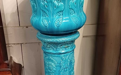 A Burmantofts Faience turquoise glazed jardiniere and stand