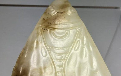A CHINESE MING DYNASTY OR EARLIER NEPHRITE JADE MOTH CARVING PENDANT