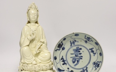 A Chinese Ming blue and white dish and a figure of Guanyin, ...