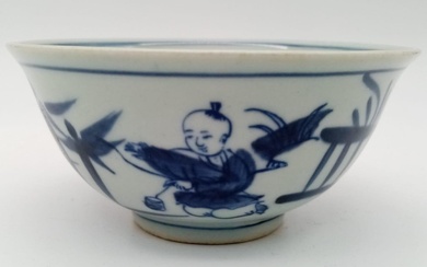 A Chinese blue and white hand painted bowl decorated...