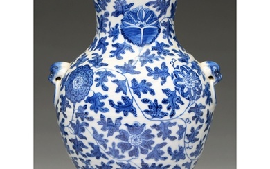 A Chinese blue and white vase, 19th c or later, painted in M...