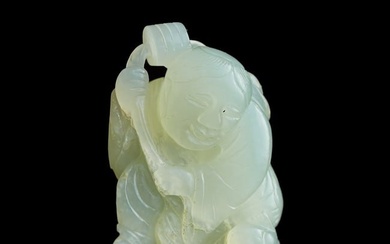 A Chinese carved jade 'boy' pendant, 19th century
