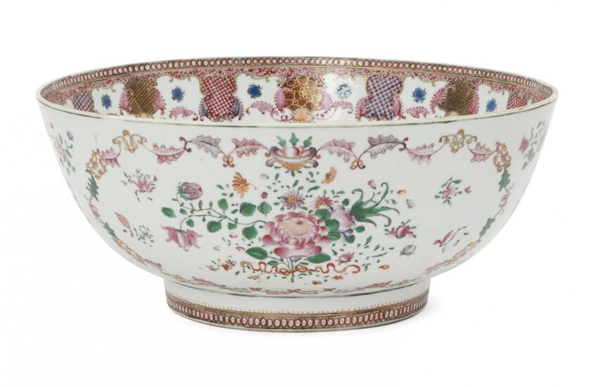 A Chinese export porcelain punch bowl, 18th century, painted in...