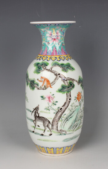 A Chinese famille rose enamelled porcelain vase, mark of Kangxi but probably 20th century or later