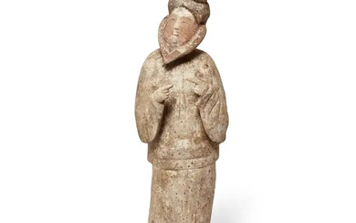A Chinese pottery figure of a bearded man Tang dynasty Modelled gracefully...