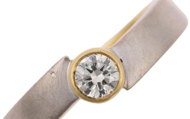 A Continental 18ct two-colour gold 0.25ct solitaire diamond ...