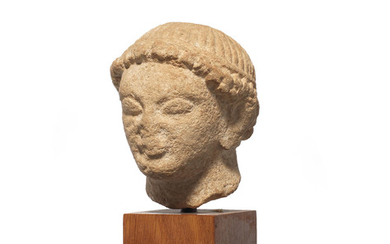 A Cypriot limestone head of a male votary