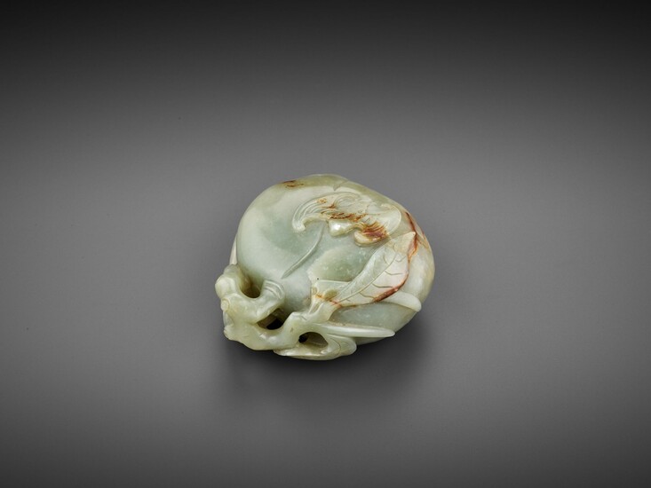 A DEEP CELADON AND RUSSET JADE ‘PEACH AND BAT’ GROUP, EARLY QING DYNASTY