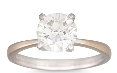 A DIAMOND SOLITAIRE RING, the brilliant cut diamond mounted ...