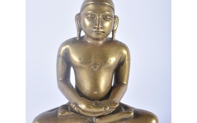 A FINE 17TH/18TH CENTURY INDIAN BRONZE FIGURE OF A SEATED BU...