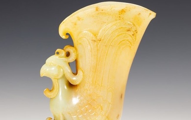 A FINE CARVED JADE VESSEL CUP