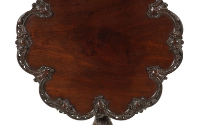 A FINE GEORGE III CHIPPENDALE CARVED MAHOGANY TILT-TOP SUPPER...