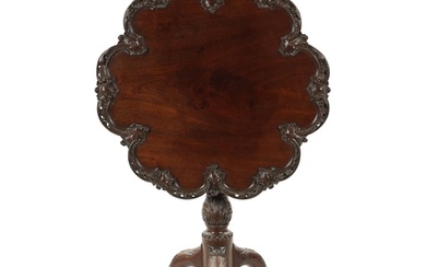 A FINE GEORGE III CHIPPENDALE CARVED MAHOGANY TILT-TOP SUPPE...
