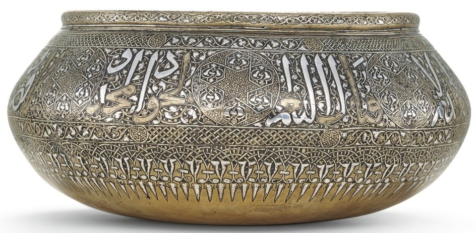 A FINE SILVER-INLAID BRASS BOWL, PERSIA, 14TH CENTURY