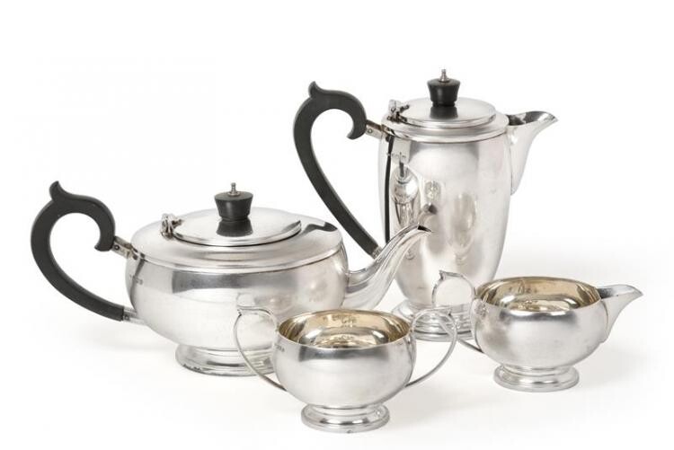 A Four-Piece George VI Silver Tea-Service, by G. Bryan and...