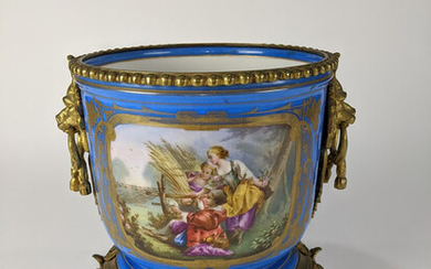A French Sevres style gilt and blue wine cooler