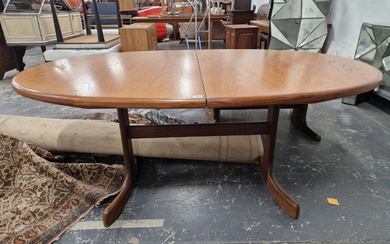 A G- PLAN TEAK EXTENDING DINING TABLE WITH MATCHING HIGH BACK CHAIRS.