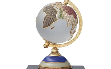 A GOLD-MOUNTED GEM SET FROSTED GLASS TABLE GLOBE MODERN