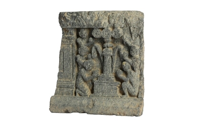 A GREY SCHIST RELIEF OF WORSHIPPERS AROUND A PILLAR Ancient region of Gandhara, 2nd -...