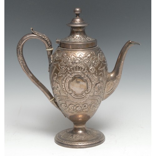 A George III Chinoiserie silver ovoid coffee pot, chased wit...