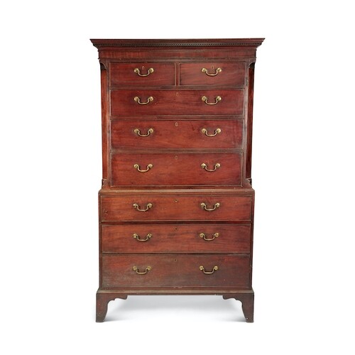 A George III mahogany chest on chest The rectangular cavetto...