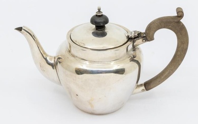 A George V silver bachelors tea pot, fruitwood handle and...